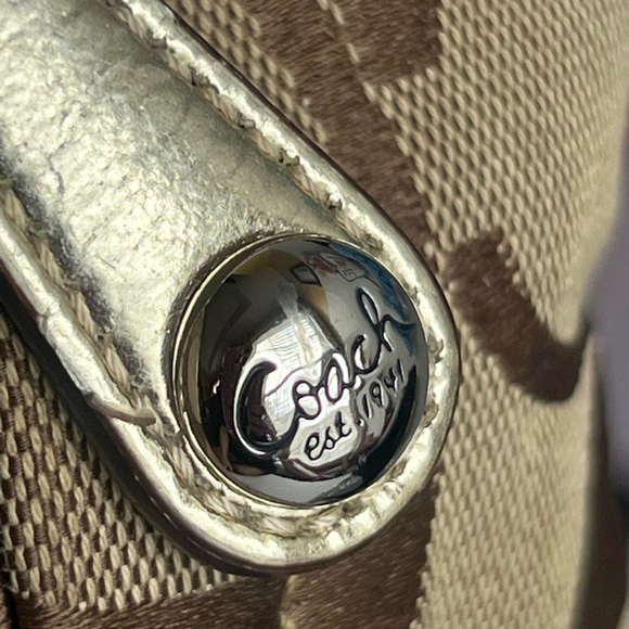 Coach Brown and Tan canvas with gold accents signature Backpack bag
